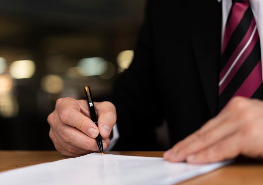 close-up-corporate-man-writing